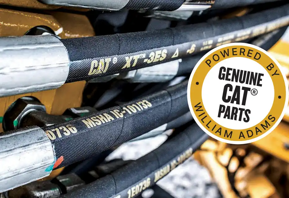Cat genuine hydraulic hoses with William Adams logo.